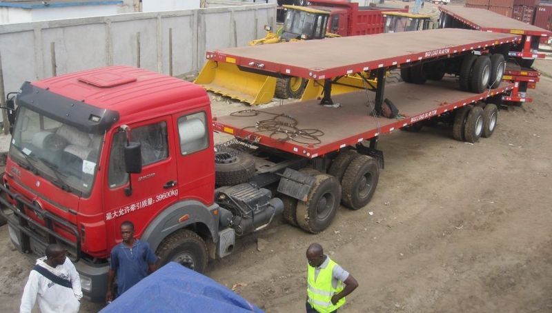 Congo, pointe noire customer inspect their beiben 2638 tractor truck and bogie suspension semitrailer